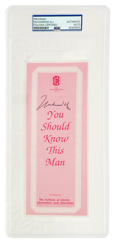 Muhammad Ali Signed Islamic Brochure Series NO.16 Pink 9x3 Pamplet - (PSA/DNA Encapsulated) - ALICUT504 - Muhammad Ali Signed Islamic Brochure Series NO.16 Pink 9x3 Pamplet - (PSA/DNA Encapsulated) product image