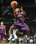 Muggsy Bogues Signed Toronto Raptors Purple Jersey Action 8x10 Photo - BOU08P200 - Muggsy Bogues Signed Toronto Raptors Purple Jersey Action 8x10 Photo product image