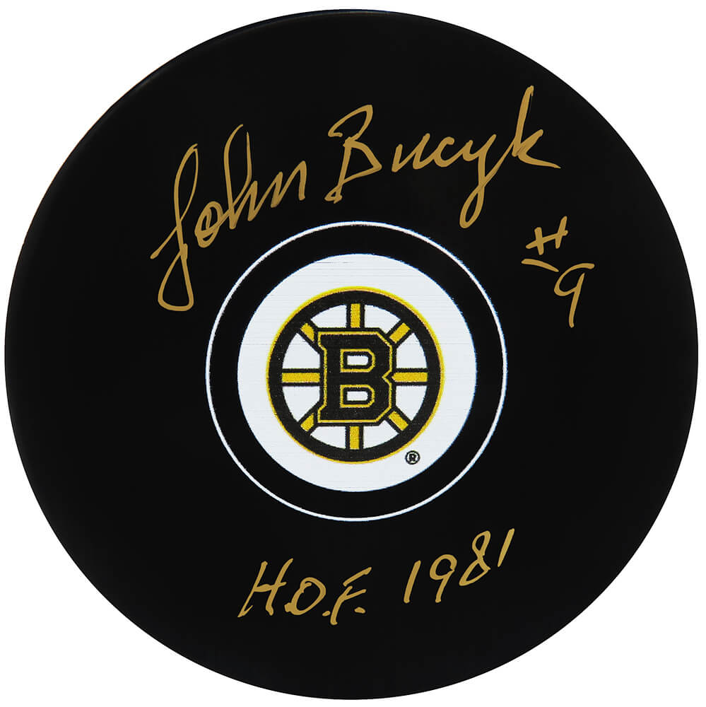 Johnny Bucyk Signed Bruins Logo Hockey Puck w/HOF 1981 (In Gold) - BUCPUC402 - Johnny Bucyk Signed Bruins Logo Hockey Puck w/HOF 1981 (In Gold) product image