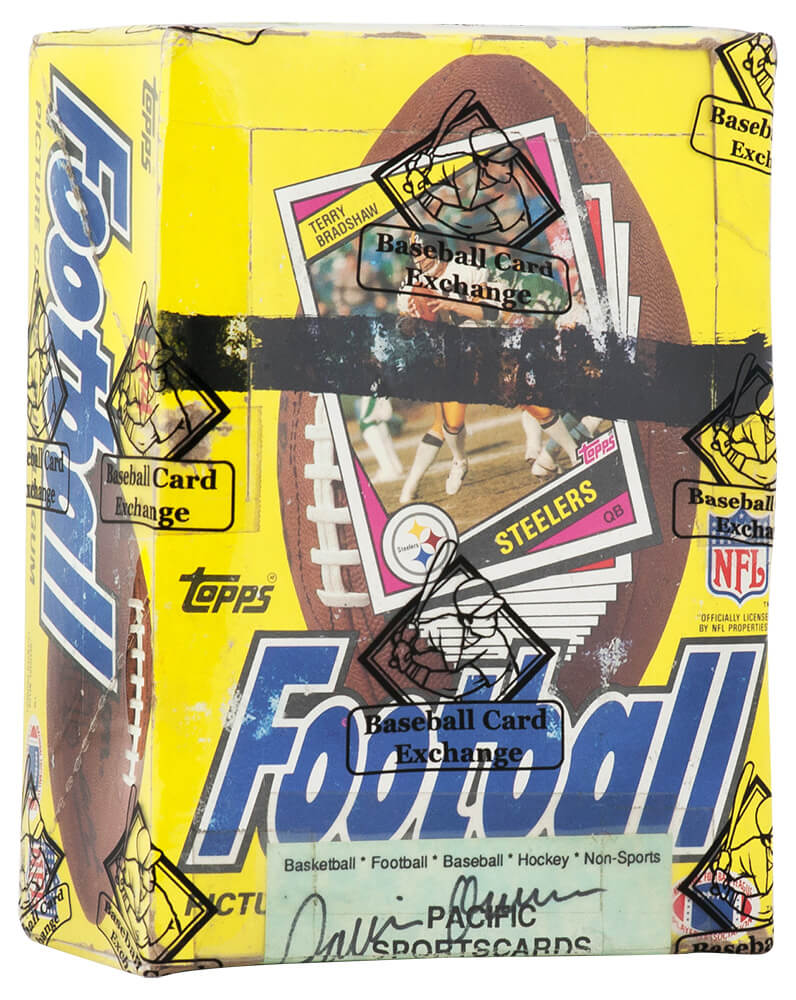 1984 Topps Football Unopened Wax Box BBCE Sealed Wrapped - 36 Packs (X-Out / Business Card Attached) (C) - BX384TWEC - 1984 Topps Football Unopened Wax Box BBCE Sealed Wrapped - 36 Packs (X-Out / Business Card Attached) (C) product image