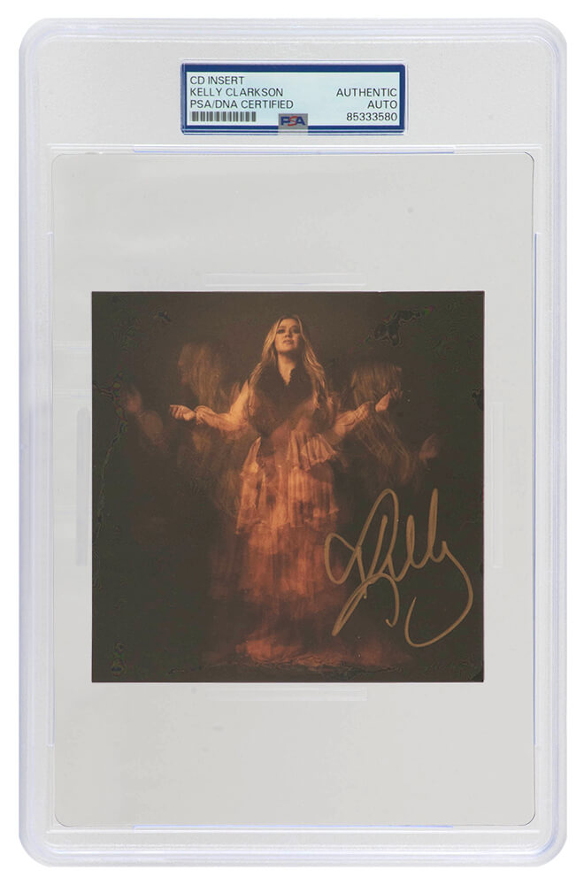 Kelly Clarkson Signed 'Chemistry' 5x5 CD Insert - (PSA/DNA Encapsulated) - CLACUT501 - Kelly Clarkson Signed 'Chemistry' 5x5 CD Insert - (PSA/DNA Encapsulated) product image