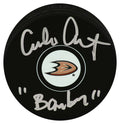 Emilio Estevez Signed Anaheim Mighty Ducks Team Logo Hockey Puck w/Bombay - ESTPUC405 - Emilio Estevez Signed Anaheim Mighty Ducks Team Logo Hockey Puck w/Bombay product image