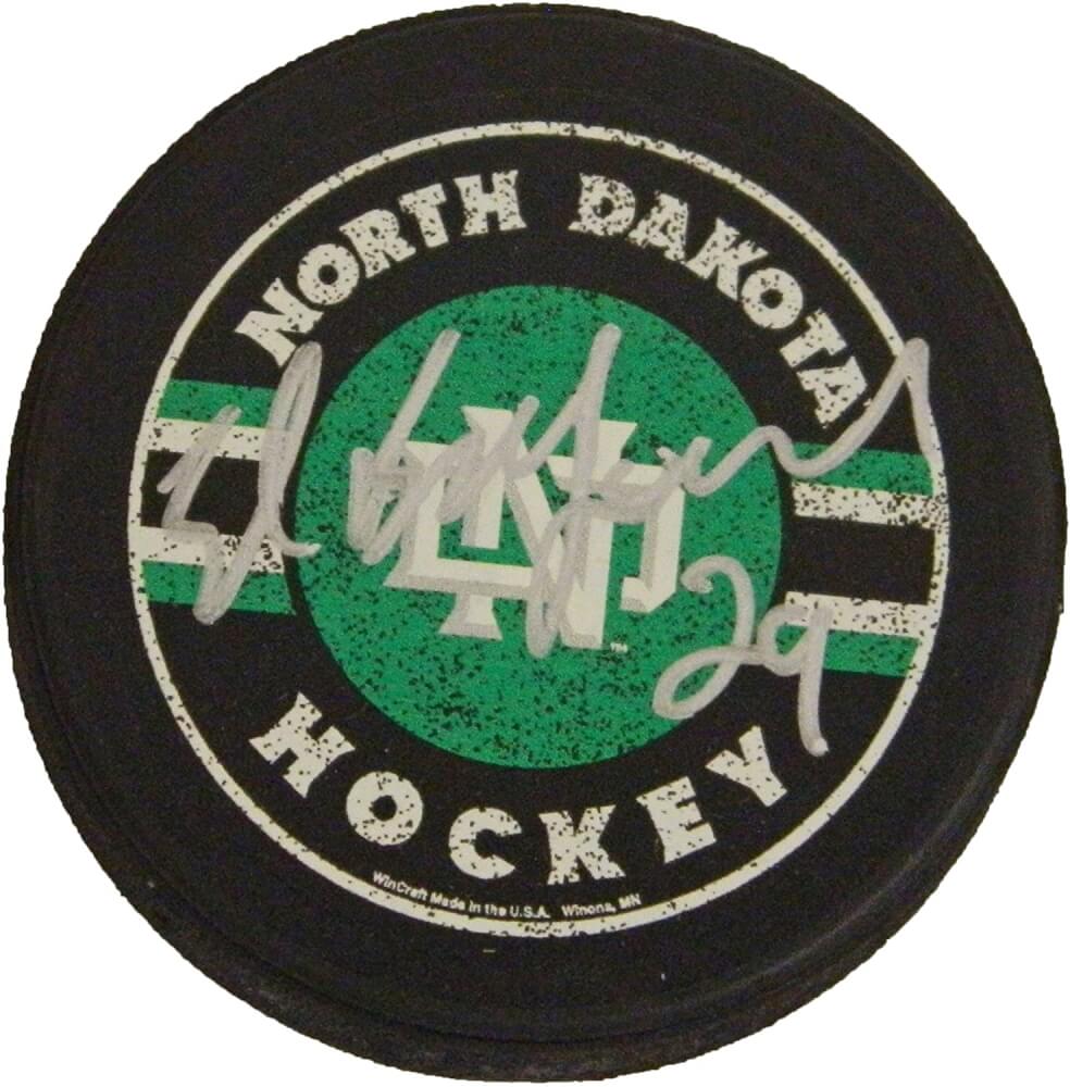 Ed Belfour Signed North Dakota Fighting Sioux Logo Hockey Puck - BELPUC404 - Ed Belfour Signed North Dakota Fighting Sioux Logo Hockey Puck product image