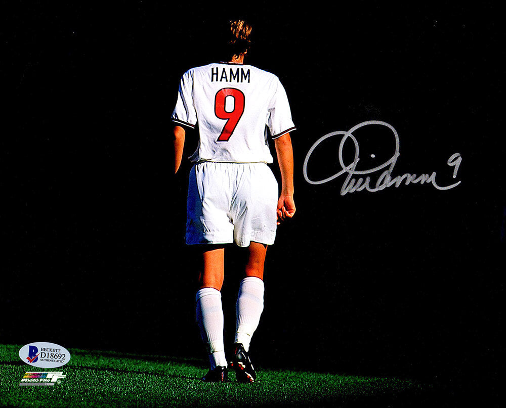 Mia Hamm Signed Soccer Back Turned 8x10 Photo (Beckett) - HAM08P504 - Mia Hamm Signed Soccer Back Turned 8x10 Photo (Beckett) product image