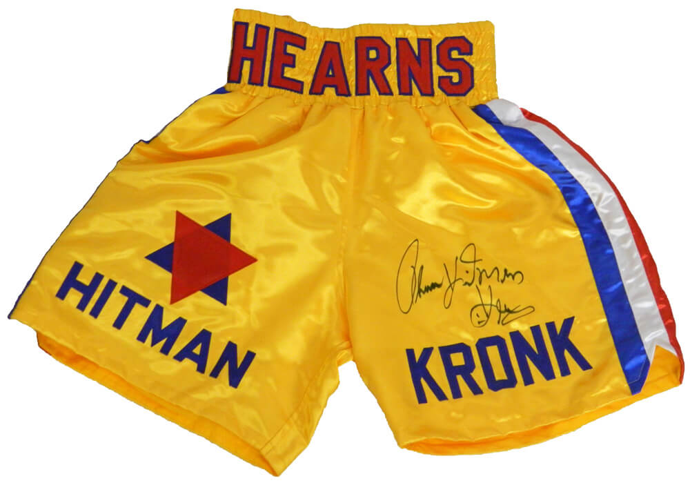 Thomas Hearns Signed Gold Hitman Boxing Trunks w/Hitman - HEATRU501 - Thomas Hearns Signed Gold Hitman Boxing Trunks w/Hitman product image