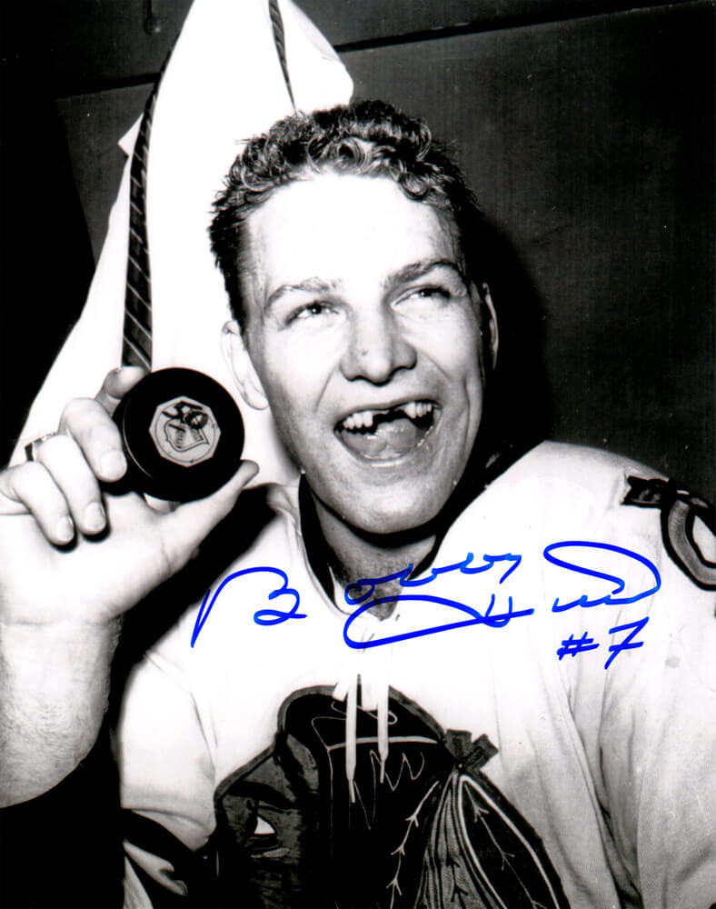 Bobby Hull Signed Blackhawks B&W Holding 1st 50th Goal Puck 8x10 Photo - HUL08P439 - Bobby Hull Signed Blackhawks B&W Holding 1st 50th Goal Puck 8x10 Photo product image