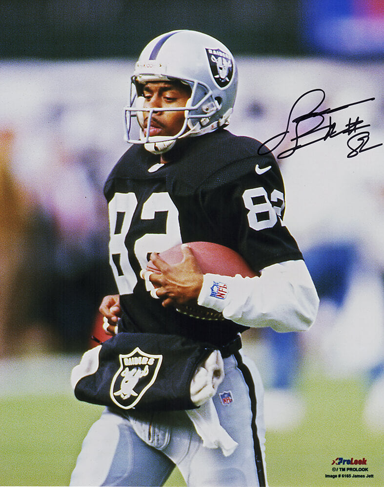 James Jett Signed Raiders Black Jersey Running With Ball 8x10 Photo - JET08P303 - James Jett Signed Raiders Black Jersey Running With Ball 8x10 Photo product image