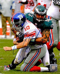 Jason Babin Signed Philadelphia Eagles Sacking Eli Manning 8x10 Photo - BAB08P301 - Jason Babin Signed Philadelphia Eagles Sacking Eli Manning 8x10 Photo product image