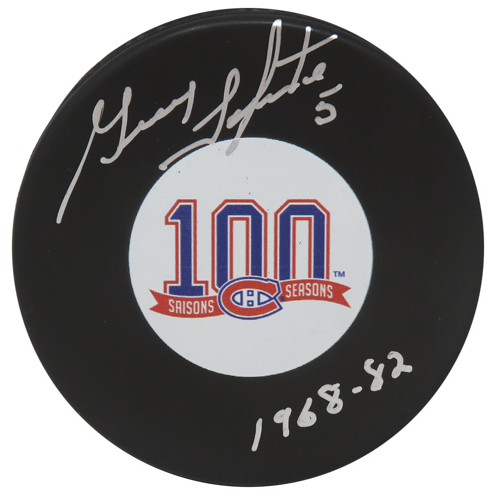 Guy Lapointe Signed Montreal Canadians 100th Season Logo Hockey Puck w/1968-82 - LAPPUC413 - Guy Lapointe Signed Montreal Canadians 100th Season Logo Hockey Puck w/1968-82 product image