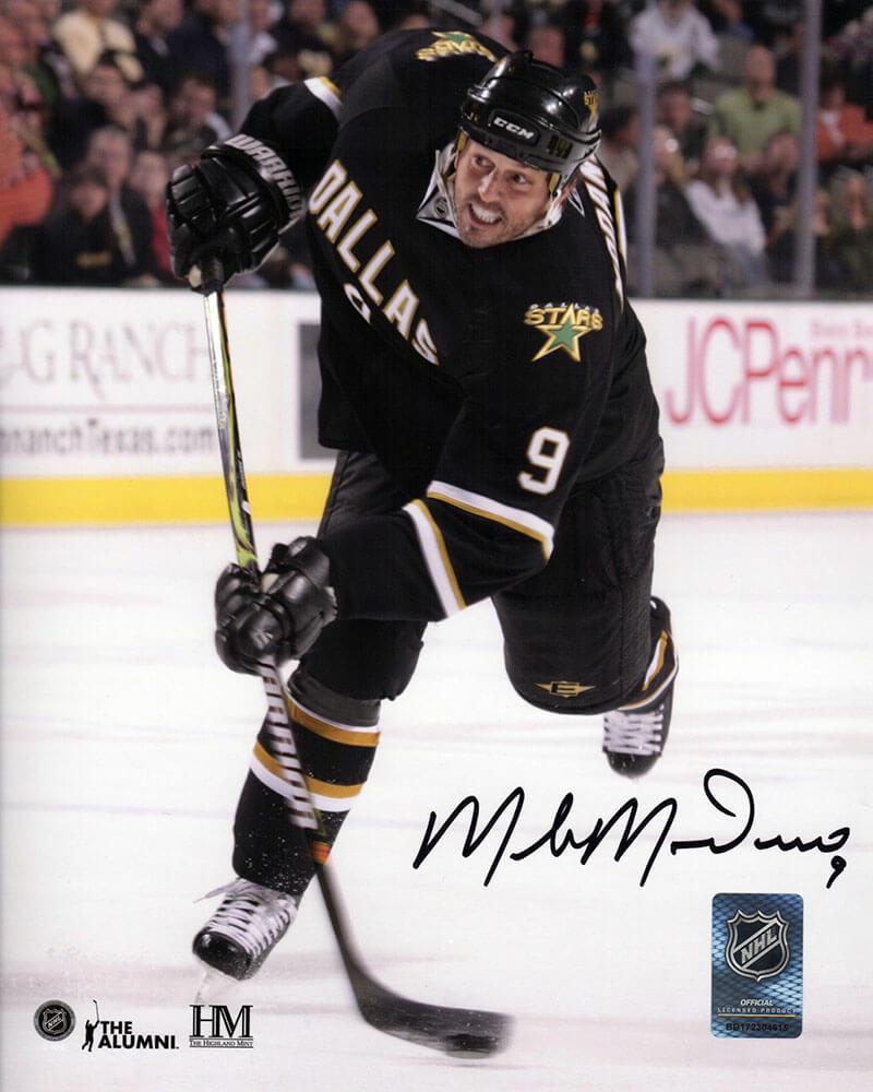Mike Modano Signed Dallas Stars Black Jersey Slap Shot Action 8x10 Photo - MOD08P413 - Mike Modano Signed Dallas Stars Black Jersey Slap Shot Action 8x10 Photo product image