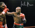 Michael Moorer Signed Boxing Puching Evander Holyfield 8x10 Photo - MOO08P500 - Michael Moorer Signed Boxing Puching Evander Holyfield 8x10 Photo product image