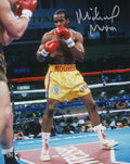 Michael Moorer Signed Boxing Gold Trunks Action 8x10 Photo - MOO08P504 - Michael Moorer Signed Boxing Gold Trunks Action 8x10 Photo product image