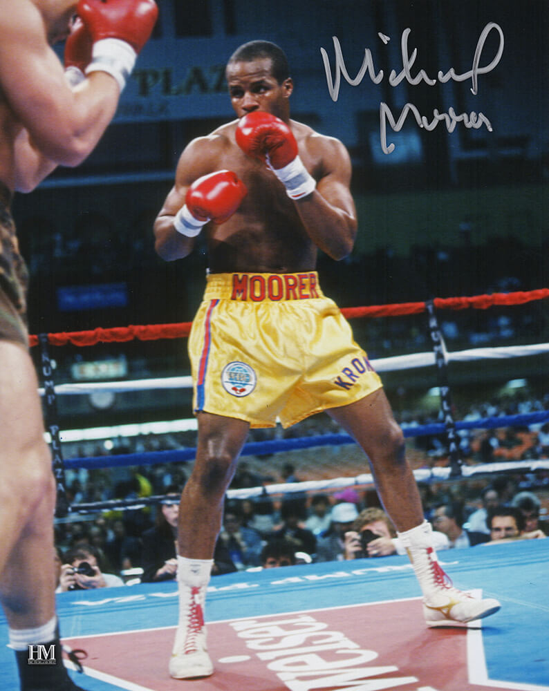 Michael Moorer Signed Boxing Gold Trunks Action 8x10 Photo - MOO08P504 - Michael Moorer Signed Boxing Gold Trunks Action 8x10 Photo product image