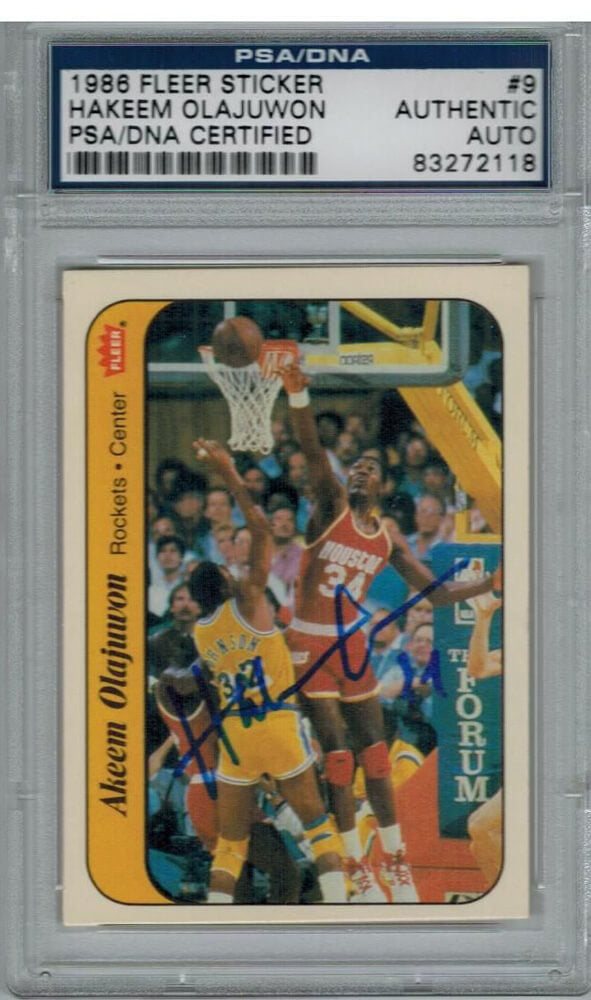 Hakeem Olajuwon Signed Rockets 1986 Fleer Sticker Rookie Card #9 - PSA/DNA - OLACAR200 - Hakeem Olajuwon Signed Rockets 1986 Fleer Sticker Rookie Card #9 - PSA/DNA product image