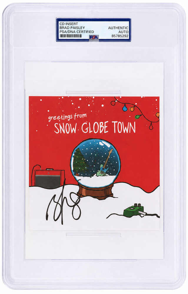Brad Paisley Signed 'Snow Globe Town' 5x5 CD Insert - (PSA/DNA Encapsulated) - PAICUT500 - Brad Paisley Signed 'Snow Globe Town' 5x5 CD Insert - (PSA/DNA Encapsulated) product image