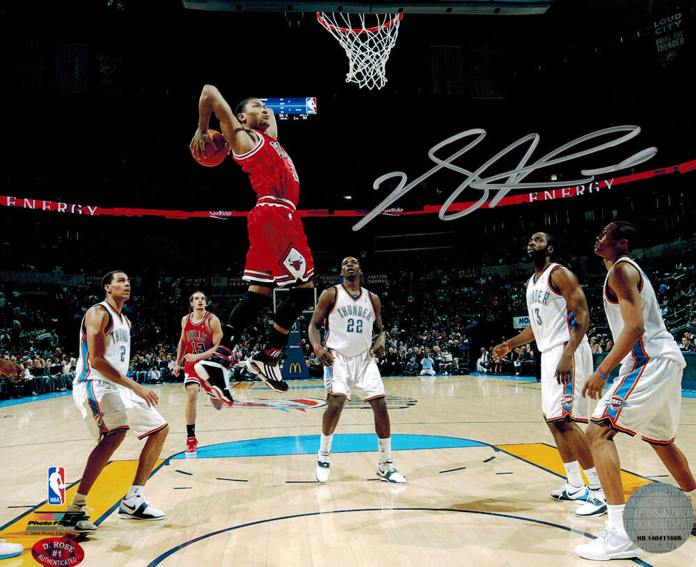 Derrick Rose Signed Bulls Action 8x10 vs Thunder (in Silver) - ROS08P204 - Derrick Rose Signed Bulls Action 8x10 vs Thunder (in Silver) product image