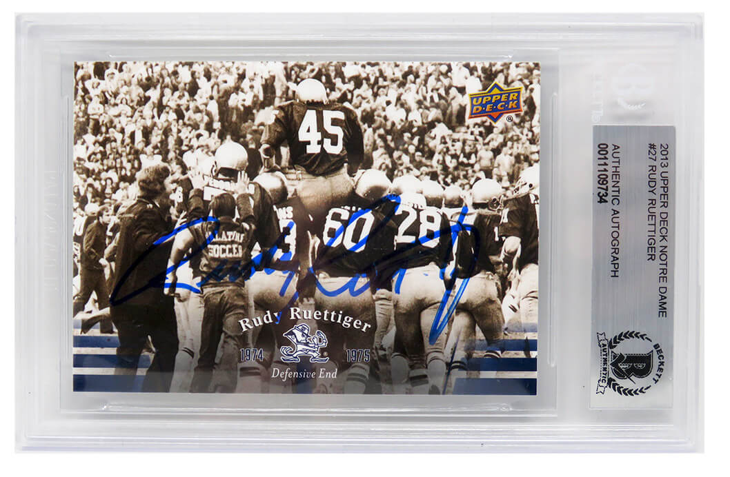 Rudy Ruettiger Signed Norte Dame 2013 Upper Deck Football Card #27 - (Beckett) - RUECAR300 - Rudy Ruettiger Signed Norte Dame 2013 Upper Deck Football Card #27 - (Beckett) product image