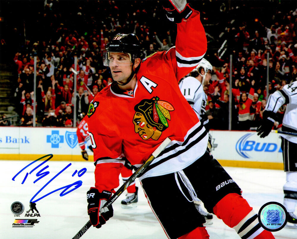 Patrick Sharp Signed Chicago Blackhawks Red Jersey Arm Raised Celebration 8x10 Photo - SHA08P444 - Patrick Sharp Signed Chicago Blackhawks Red Jersey Arm Raised Celebration 8x10 Photo product image