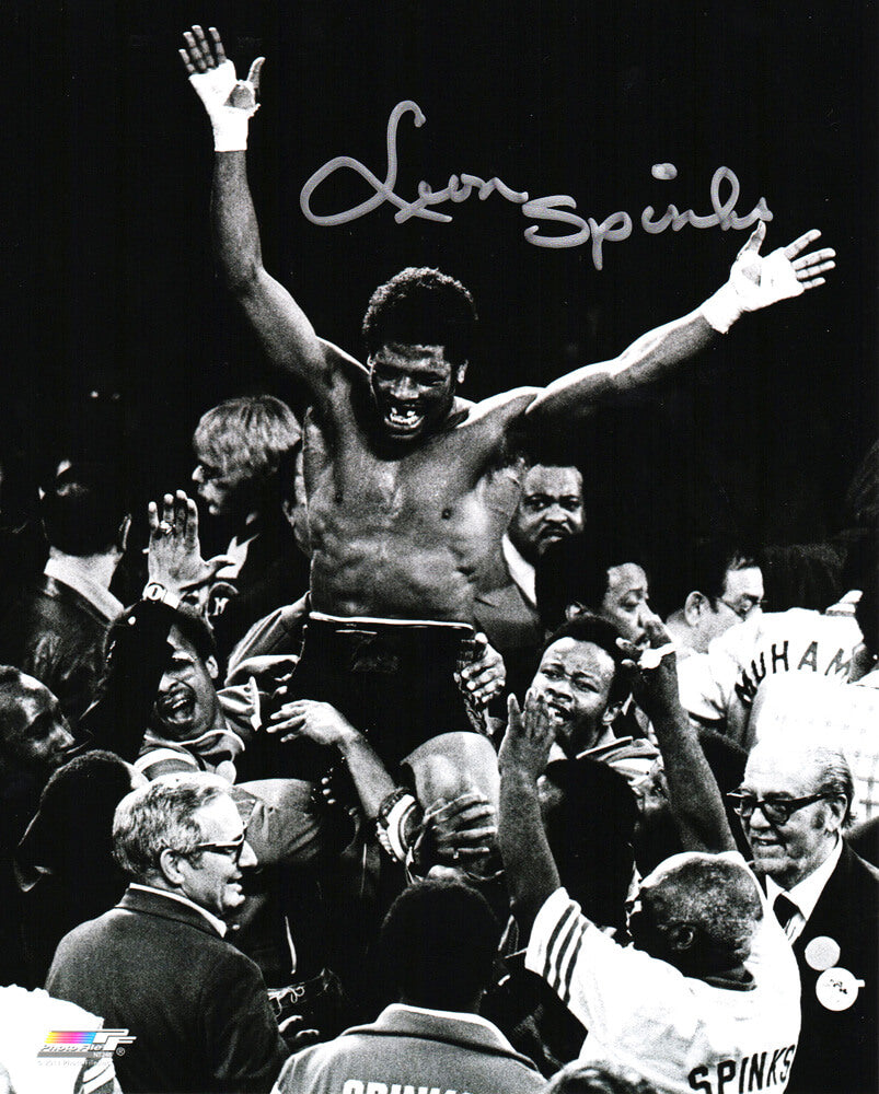Leon Spinks Signed Boxing Win Over Muhammad Ali Celebration B&W 8x10 Photo - SPI08P511 - Leon Spinks Signed Boxing Win Over Muhammad Ali Celebration B&W 8x10 Photo product image