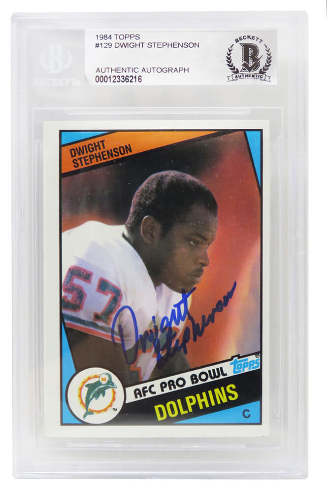 Dwight Stephenson Signed Miami Dolphins 1984 Topps Rookie Football Trading Card #129 - (Beckett Encapsulated) - STECAR310 - Dwight Stephenson Signed Miami Dolphins 1984 Topps Rookie Football Trading Card #129 - (Beckett Encapsulated) product image