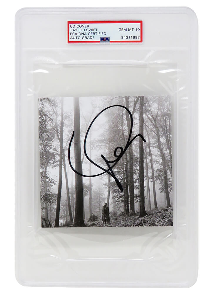 Taylor Swift Signed Folklore "In The Trees" CD Cover - (PSA/DNA Encapsulated - Auto 10 Grade) - SWICAR503 - Taylor Swift Signed Folklore "In The Trees" CD Cover - (PSA/DNA Encapsulated - Auto 10 Grade) product image