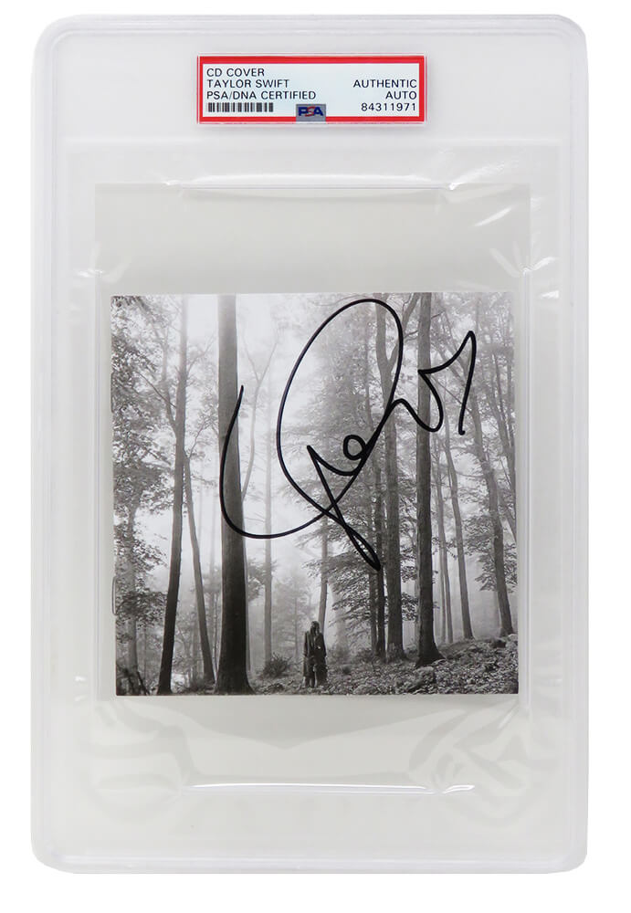 Taylor Swift Signed Folklore "In The Trees" CD Cover - (PSA/DNA Encapsulated) - SWICAR502 - Taylor Swift Signed Folklore "In The Trees" CD Cover - (PSA/DNA Encapsulated) product image