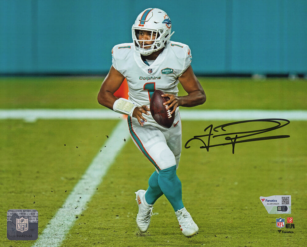 Tua Tagovailoa Signed Miami Dolphins White Jersey With Football Action 8x10 Photo - (Fanatics) - TAG08P301 - Tua Tagovailoa Signed Miami Dolphins White Jersey With Football Action 8x10 Photo - (Fanatics) product image