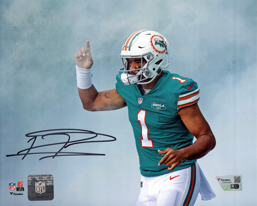 Tua Tagovailoa Signed Miami Dolphins Teal Jersey Pointing 8x10 Photo - (Fanatics) - TAG08P302 - Tua Tagovailoa Signed Miami Dolphins Teal Jersey Pointing 8x10 Photo - (Fanatics) product image