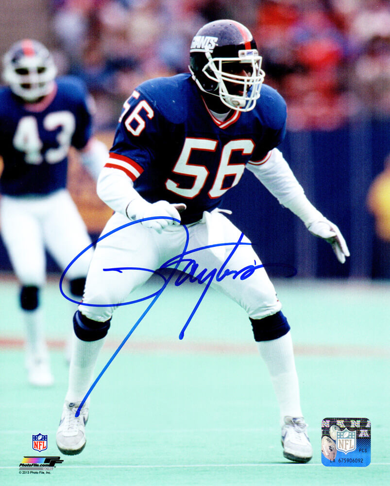 Lawrence Taylor Signed New York Giants Blue Jersey Action 8x10 Photo - TAY08P306 - Lawrence Taylor Signed New York Giants Blue Jersey Action 8x10 Photo product image