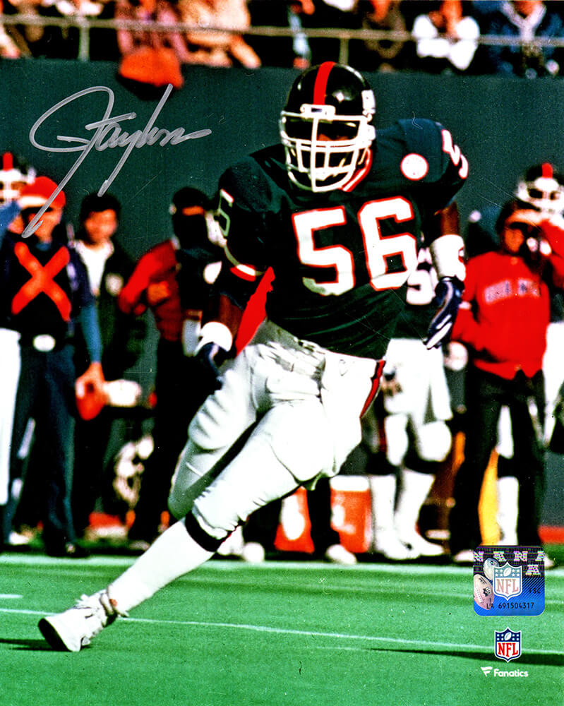Lawrence Taylor Signed NY Giants Blue Jersey Action 8x10 Photo - TAY08P308 - Lawrence Taylor Signed NY Giants Blue Jersey Action 8x10 Photo product image