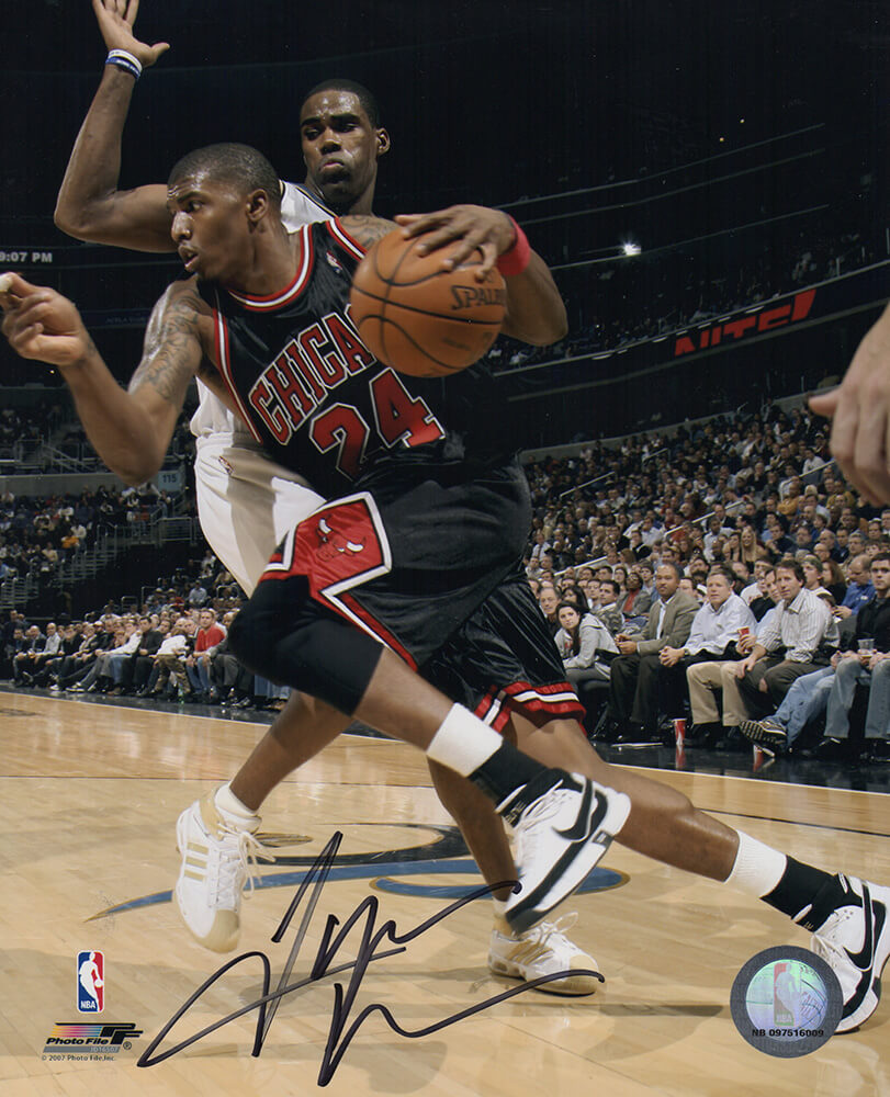 Tyrus Thomas Signed Chicago Bulls Black Jersey Dribbling 8x10 Photo - THO08P223 - Tyrus Thomas Signed Chicago Bulls Black Jersey Dribbling 8x10 Photo product image