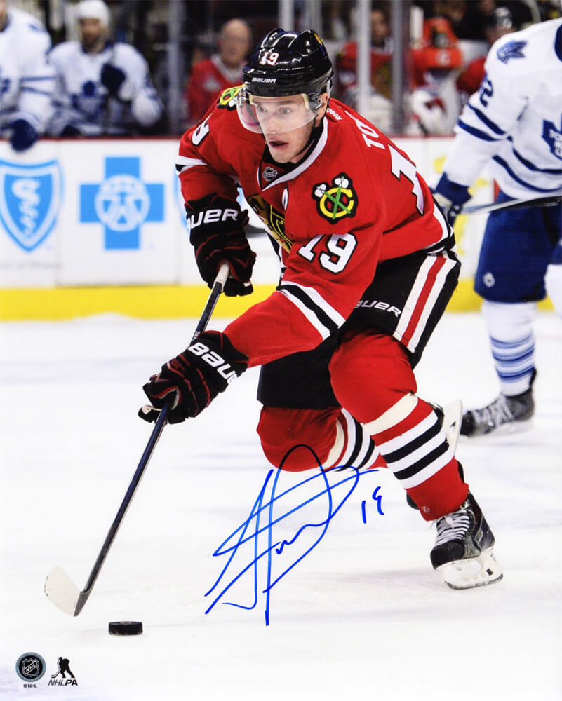Jonathan Toews Signed Chicago Blackhawks With Puck Action 8x10 Photo - TOE08P404 - Jonathan Toews Signed Chicago Blackhawks With Puck Action 8x10 Photo product image