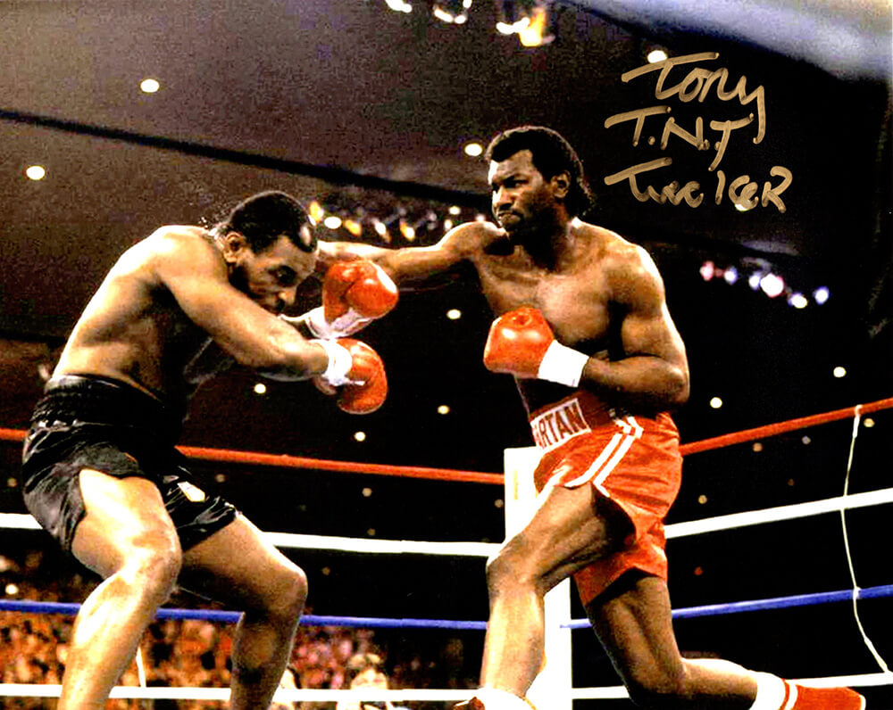 Tony Tucker Signed Boxing Action vs Mike Tyson 8x10 Photo w/TNT - TUC08P500MYS - Tony Tucker Signed Boxing Action vs Mike Tyson 8x10 Photo w/TNT product image