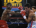 Pernell 'Sweet Pea' Whitaker Signed Boxing Red Trunks Punching Action 8x10 Photo - (JSA) - WHI08P501 - Pernell 'Sweet Pea' Whitaker Signed Boxing Red Trunks Punching Action 8x10 Photo - (JSA) product image